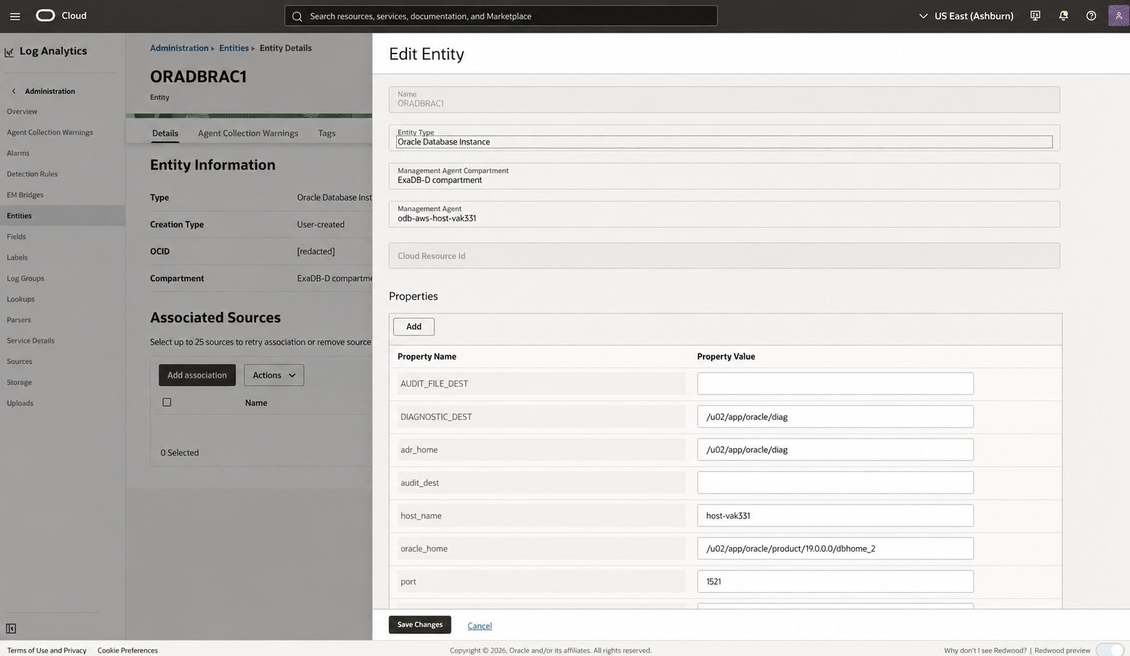 Public-safe OCI Log Analytics Edit Entity view for the ORADBRAC1 Oracle Database Instance and its node-specific Management Agent properties.